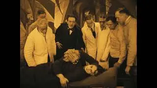 Cesrae&rsquo;s body is brought to Dr. Caligari. The Cabinet of Dr. caligari (Robert Wiene, 1920)