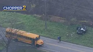 Two killed, two injured when SUV hits back of school bus in Kane County