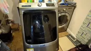 Ошибка F9 E1 при очистке фильтра сливного насоса стиральной машины Maytag MHW5630HC2
