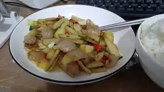 Stir fried potatoes with cured pork