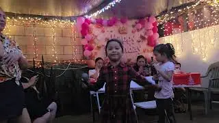 Kamea  and Brielle.. carolling 