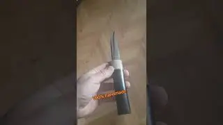 Cuțit realizat &icirc;n &icirc;ntregime manual
