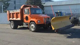 1995 Freightliner FL70 Dump Truck with Snow Plow - Auctions International 