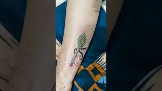Feather Tattoo | Flute Tattoo | Letter Tattoo | Small Heart Tattoo | Wrist Tattoo