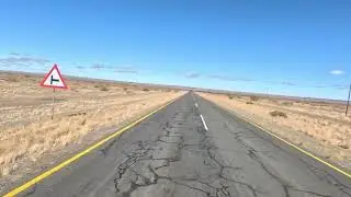 Sun 5 Mar 09h46: GP-Sign on left to Fish River Canyon; more ver verlate vlaktes; bike tourists!
