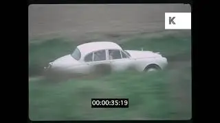 1960s UK, White Jaguar Saloon Driving Through Countryside, Sports Car, 35mm