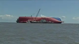 What steps are response crews taking to empty the ship's fuel tanks