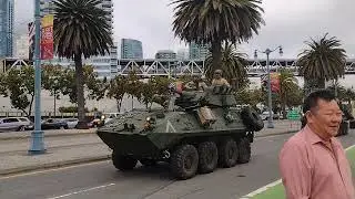 Military convoy in the streets of San Francisco (the Embarcadero).