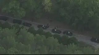 Police: Man found shot to death in woods near Georgia International Horse Park in Conyers, 1 detaine