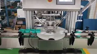 Automatic rotary jar foil closing machine