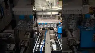 500ml bottle shrink wrapping machine #machne #shrink wrapping machine #shrink wrapping #automatic
