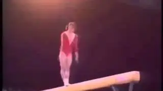 Balance Beam Back Handspring Pike Swing Down to Cross Straddle Sit Gymnastics Video