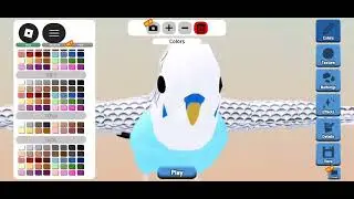 I played feather family and made one of my budgies :3