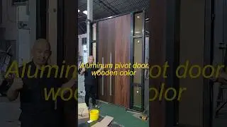 Discover our pivot door with wooden color. #door #doors #securitydoor