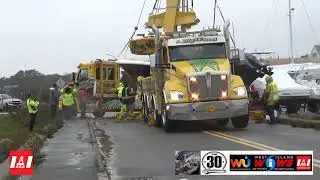 BOAT SALVAGE BY BIG WHEELS CRANE AND TOW BOAT US OCT 27 2021 4PM WEST ISLAND MA