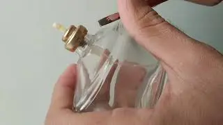 How to Remove/open a perfume bottle cap/top using a flat screwdriver.