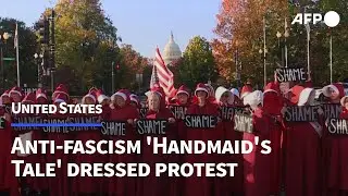 Protesters in 'Handmaid's Tale' red cloaks rally against 'fascism' in US | AFP