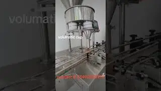 Jar filler volumatic cup