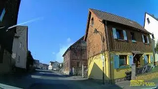 D: Markt Oberelsbach. Landkreis Rh&ouml;n-Grabfeld. Rundfahrt durch die Ortsmitte. April 2025