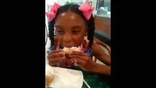 Isharia Eating Beignets for the First Time
