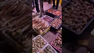 A market selling wild mushrooms, Matsutake is very cheap