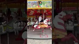 Joyful Whirl: Kids Delight in Magical Merry-Go-Round Adventure! #carouselride