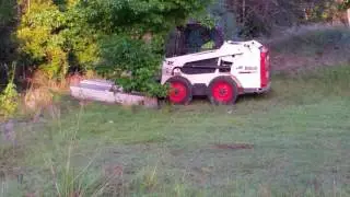 BOBCAT with Slasher Attachment via Kym Simons Earthmover - KSEM