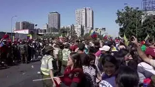 Venezuelans gather in Santiago to celebrate U.S. military operation to capture President Maduro.