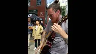 Portland street musician, Adrian Belle of Sac, CA.