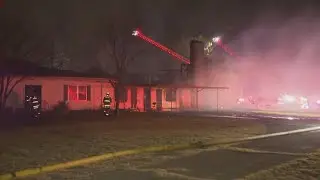 Crews work to extinguish fire at an abandoned home in southern Dallas