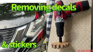 Removing stickers//decals from my car using the decal removing tool #diy