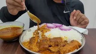 EATING WHITE RICE WITH FISH CURRY