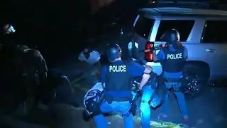 DOJ lists police failures in Ferguson protests