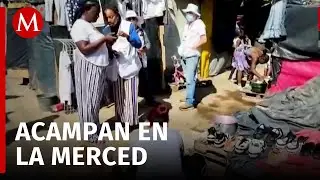 Migrantes instalan campamentos temporales en La Merced, CdMx