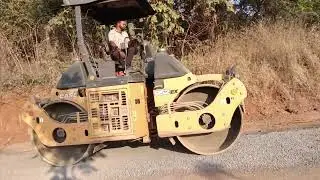 Road Construction Process | Bitumen Spray on Stone Base road rolar compaction  vallage road work 