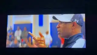 Deion Sanders cuts player in front of the team.