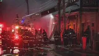 Business owners report power outage amid large fire at Portland Pier