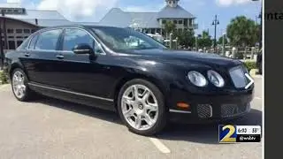 Barry Bannister - Agents raid car dealership after tip by Channel 2 WSB TV