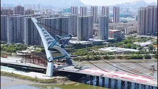 China's first A-shaped steel tower completes vertical rotation in Qingdao