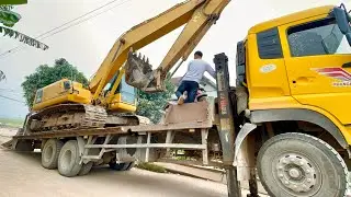 Hai thanh niên trổ tải lái ô tô tải TMT chở máy xúc volvo tới công trường đào sắn dây và cái kết