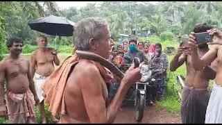 Snake catching by a village old man.