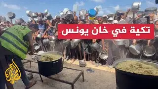 طوابير أمام تكية لتوزيع الطعام على نازحين في خان يونس