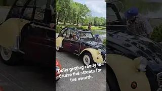 Citroen 2CV Dolly getting ready to cruise with other classics at Celebration Exotic Car Festival