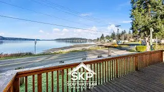 Waterfront Views at Snug Harbor &ndash; Bright 2BD/1.75BA Home with a Large Deck and Great Room!