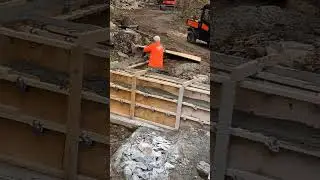 Concrete pumping knee wall for a bridge #disasterrelief   #concretepumping