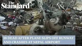 18 dead after plane slips off runway and crashes at Nepal airport
