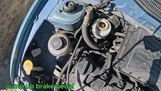 2002 Nissan Micra rotors,  pads, coolant expansion tank replacement & radiator coolant change