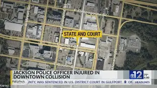 Jackson police officer, driver injured in crash