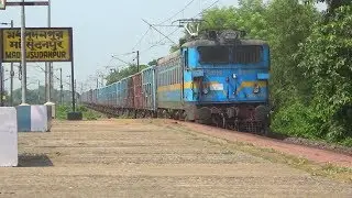 Indian Railways MGS/WAG-7/27013 series Locomotive pulling a Freight Train with 50 Wagons