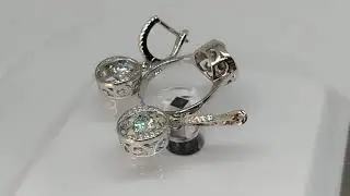 Комплект с африканскими Light Aqua Blue муассанитами 1.29ct (5мм), лампы